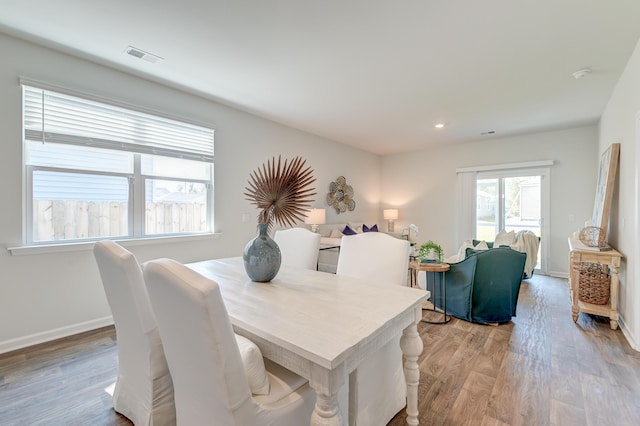 dining space featuring light hardwood / wood-style flooring