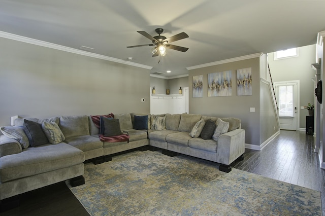 living room with ceiling fan, crown molding, and dark wood-type flooring