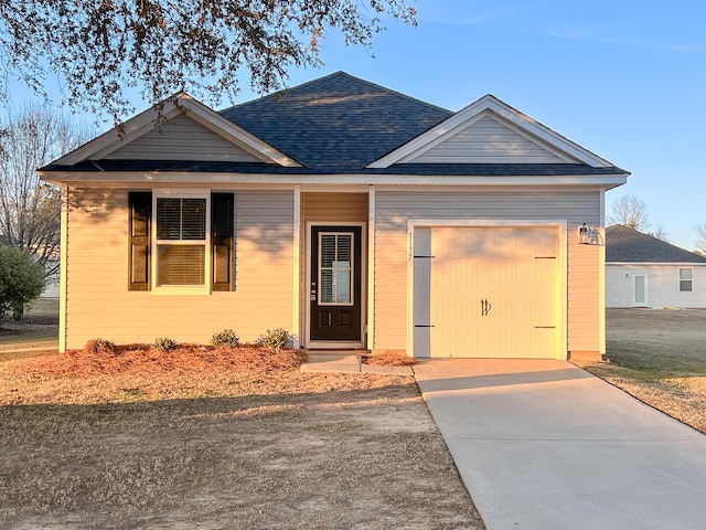 view of front of house with a garage