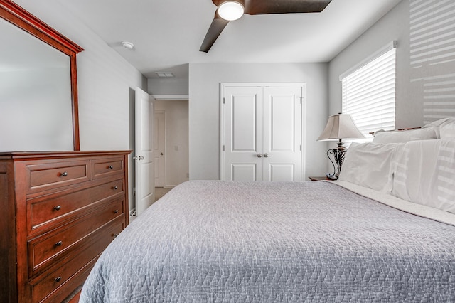 bedroom with a closet and ceiling fan