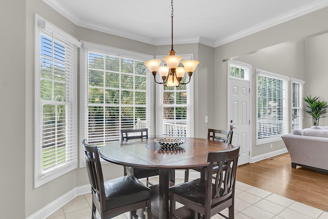 591 Two Mile Run, Johns Island, SC 29455 - dining area featuring light tile patterned flooring, plenty of natural light, a chandelier, and ornamental molding