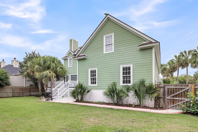591 Two Mile Run, Johns Island, SC 29455 - rear view of property with a chimney, stairway, and a deck