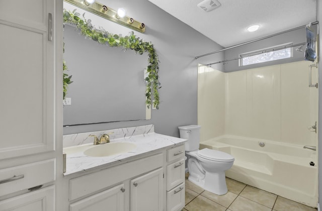 full bathroom featuring visible vents, toilet, tile patterned flooring, vanity, and shower / washtub combination