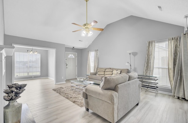 living area with visible vents, plenty of natural light, and light wood-style flooring