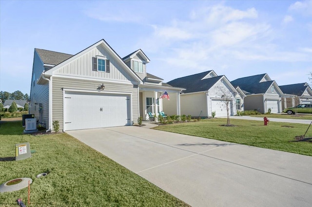 view of front of house with cooling unit, a front yard, and a garage