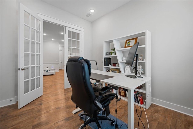 office area with dark wood-type flooring and french doors