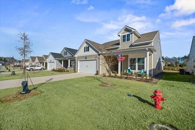 view of front of property with a front lawn and a garage