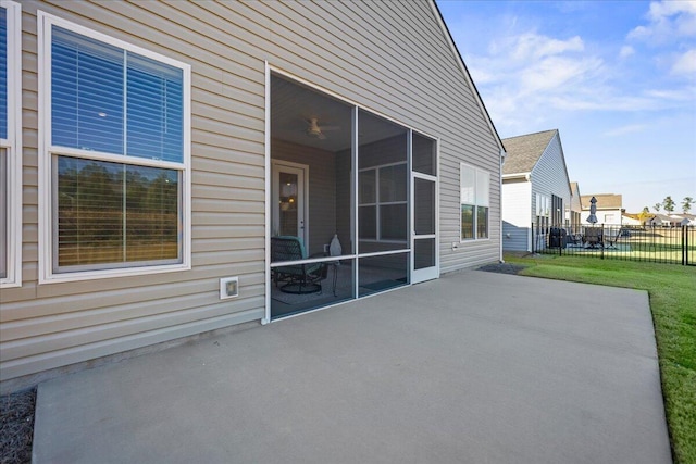 view of patio / terrace with a sunroom