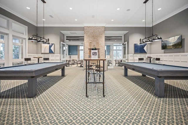 recreation room with pool table, ornamental molding, and carpet floors