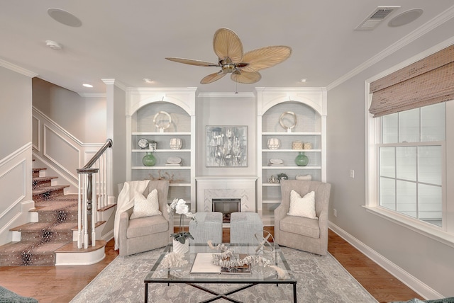 2036 Kings Gate Ln, Mount Pleasant, SC 29466 - living area with ceiling fan, wood finished floors, stairway, a fireplace, and crown molding