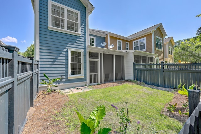 2036 Kings Gate Ln, Mount Pleasant, SC 29466 - rear view of property featuring a sunroom and a fenced backyard