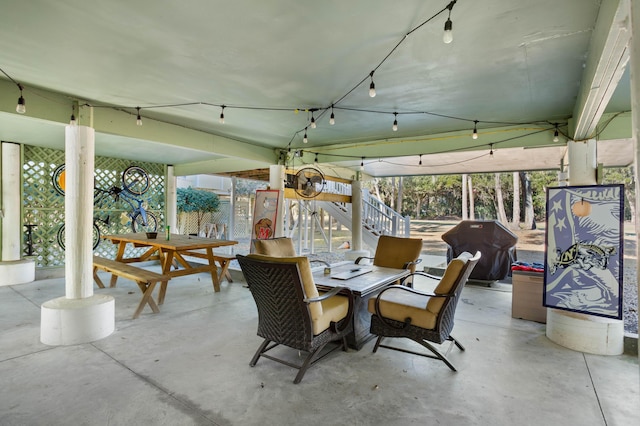 dining room featuring concrete flooring