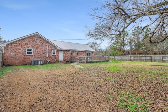 view of yard with central AC