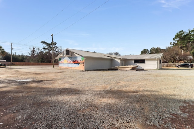 exterior space with an outbuilding