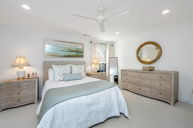 bedroom with a ceiling fan, visible vents, recessed lighting, and light colored carpet