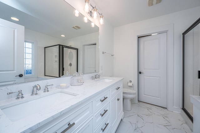 bathroom with a shower stall, visible vents, marble finish floor, and a sink