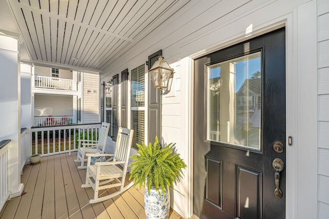 wooden deck featuring a porch