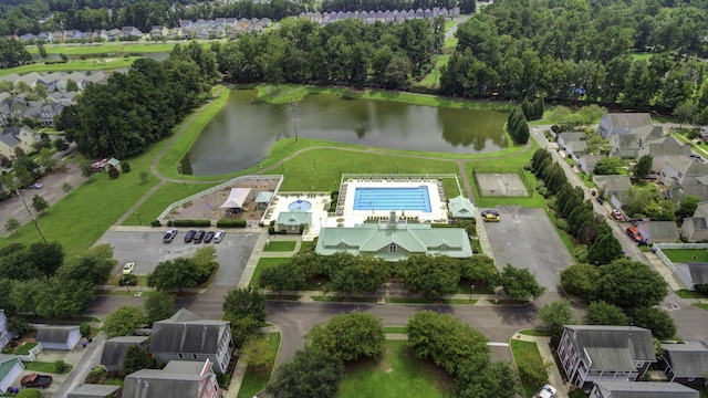 bird's eye view with a residential view and a water view