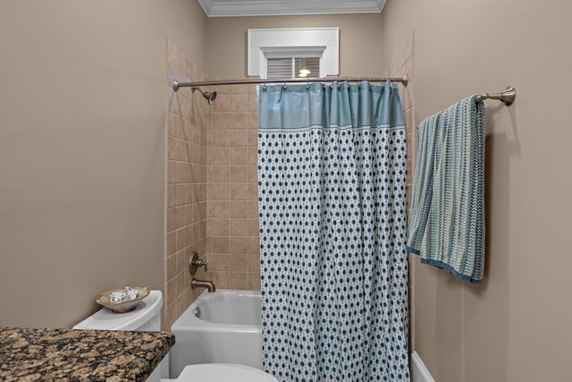 bathroom with toilet, shower / bath combo, and crown molding