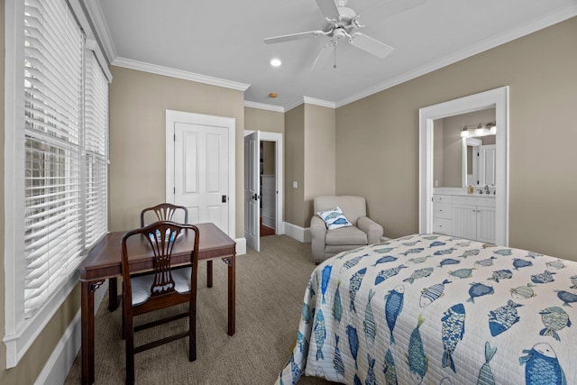 bedroom with ornamental molding, a sink, connected bathroom, carpet, and baseboards