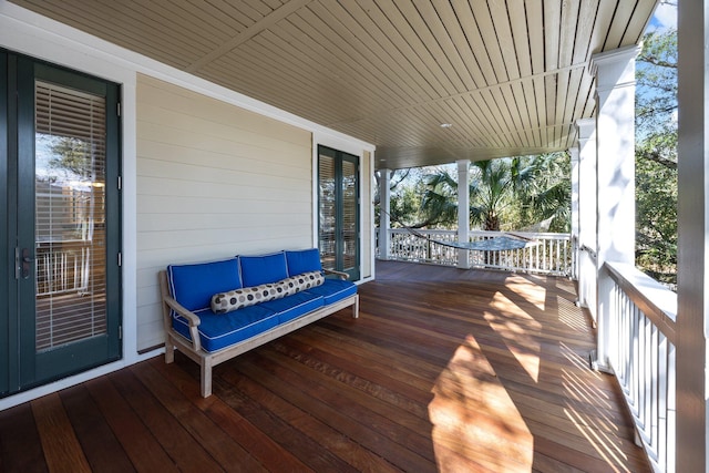 wooden deck featuring a porch