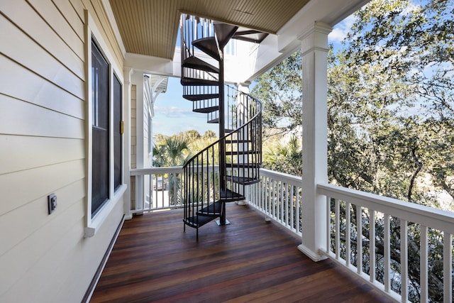 balcony featuring stairs