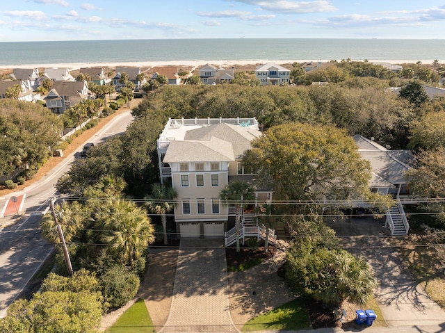 bird's eye view featuring a water view and a residential view