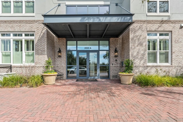 entrance to property featuring french doors