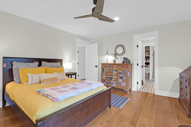 bedroom featuring ceiling fan and light wood-type flooring