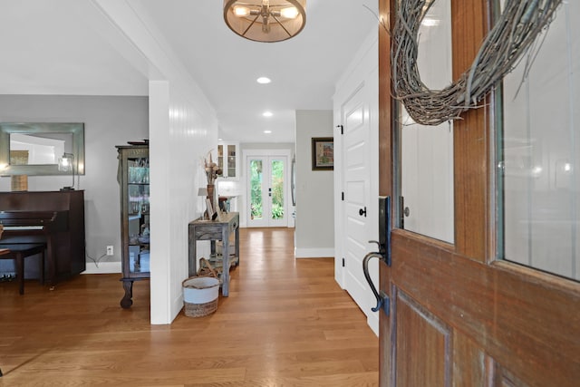 entryway with light hardwood / wood-style flooring