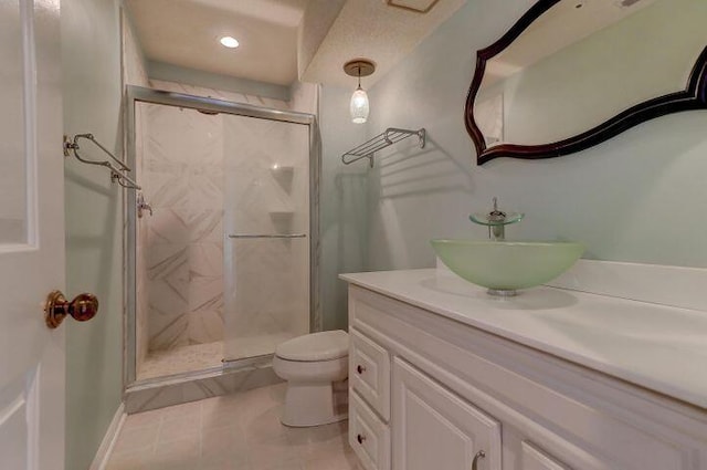 bathroom featuring walk in shower, toilet, tile flooring, and vanity