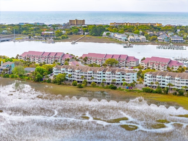 bird's eye view with a water view