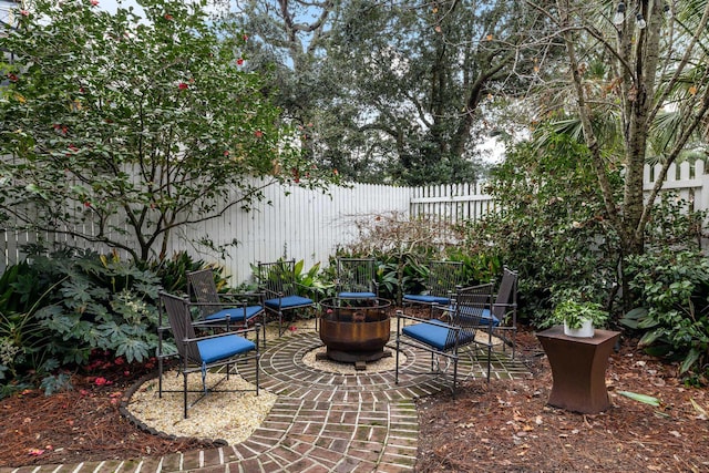 view of patio / terrace featuring a fire pit