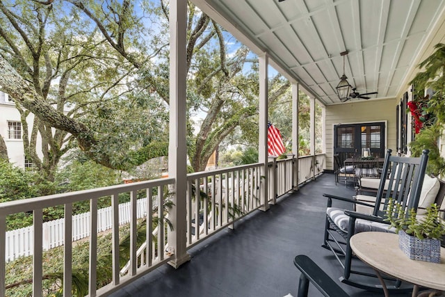 balcony featuring ceiling fan