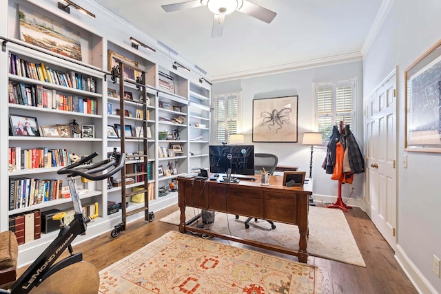 office area with crown molding, wood-type flooring, and ceiling fan