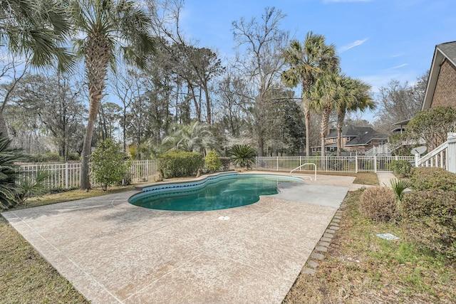 view of pool featuring a patio area, a fenced backyard, and a fenced in pool