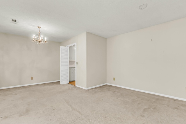 131 Wedgewood Cir, Goose Creek, SC 29445 - spare room featuring a chandelier and light colored carpet