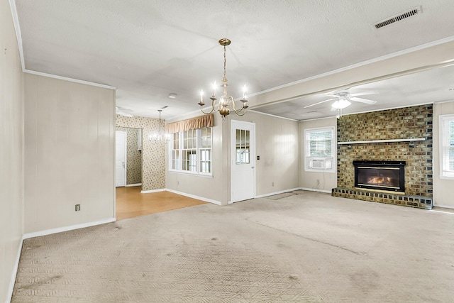 131 Wedgewood Cir, Goose Creek, SC 29445 - unfurnished living room with a chandelier, carpet floors, ornamental molding, a fireplace, and a ceiling fan