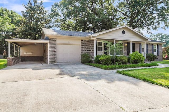 131 Wedgewood Cir, Goose Creek, SC 29445 - view of front of property with driveway, brick siding, an attached garage, a carport, and a front yard