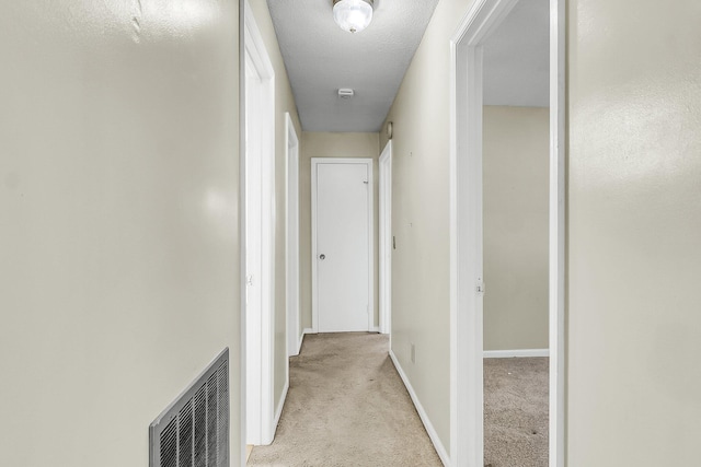 131 Wedgewood Cir, Goose Creek, SC 29445 - corridor with light carpet and baseboards