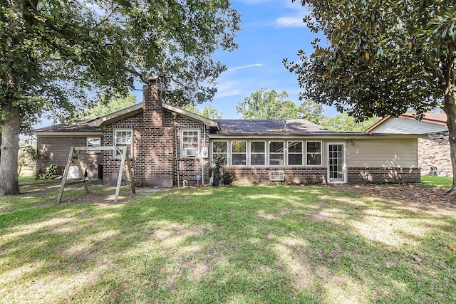 131 Wedgewood Cir, Goose Creek, SC 29445 - rear view of house featuring brick siding, a yard, a chimney, and cooling unit