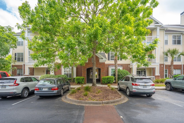 exterior space with uncovered parking