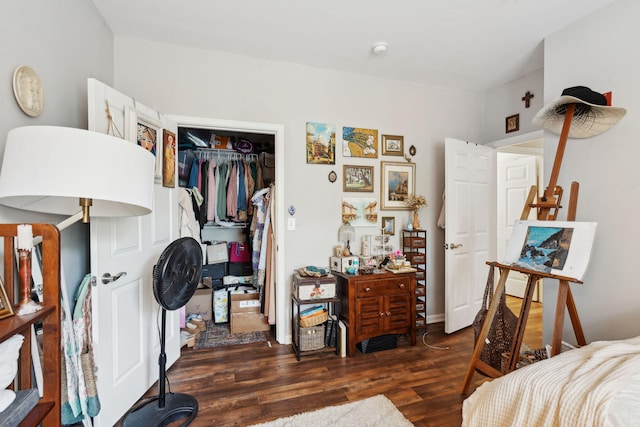 bedroom with a closet and wood finished floors