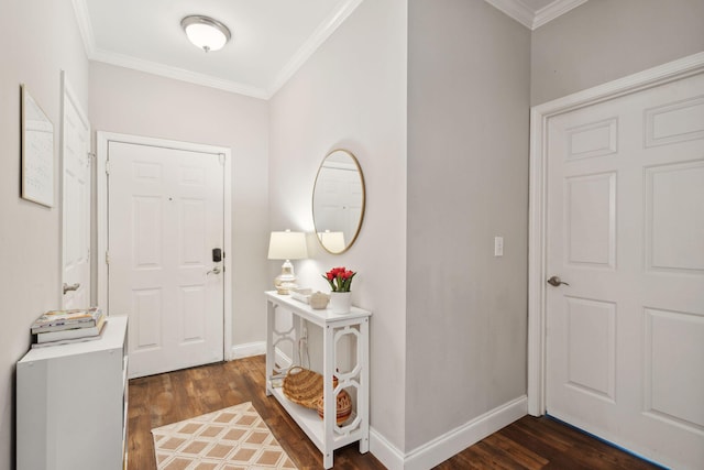 entryway with baseboards, ornamental molding, and dark wood-style flooring