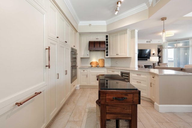 kitchen featuring a peninsula, custom range hood, open floor plan, crown molding, and light countertops