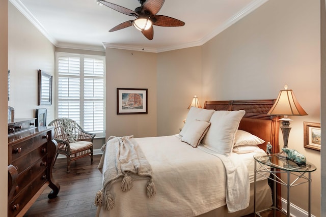 bedroom featuring wood-type flooring, ornamental molding, baseboards, and ceiling fan