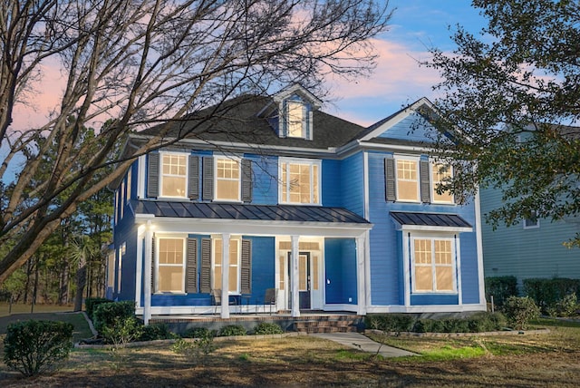 view of front facade featuring covered porch