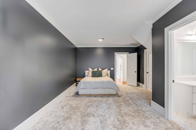 bedroom featuring crown molding, carpet floors, and baseboards