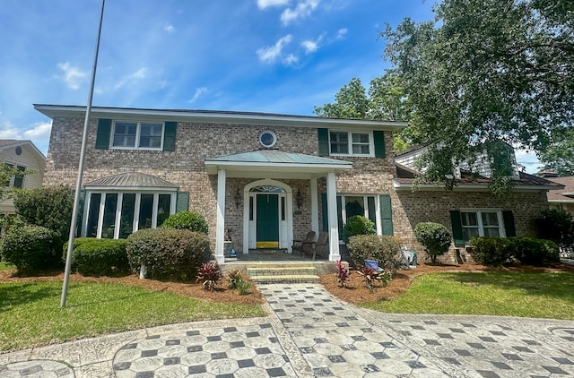 1866 Capri Dr, Charleston, SC 29407 - view of front of property featuring brick siding and a front lawn