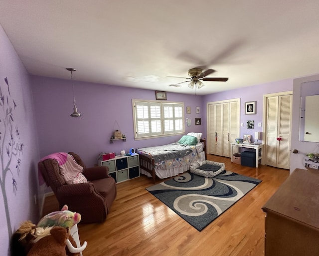 1866 Capri Dr, Charleston, SC 29407 - bedroom featuring multiple closets, wood finished floors, and ceiling fan